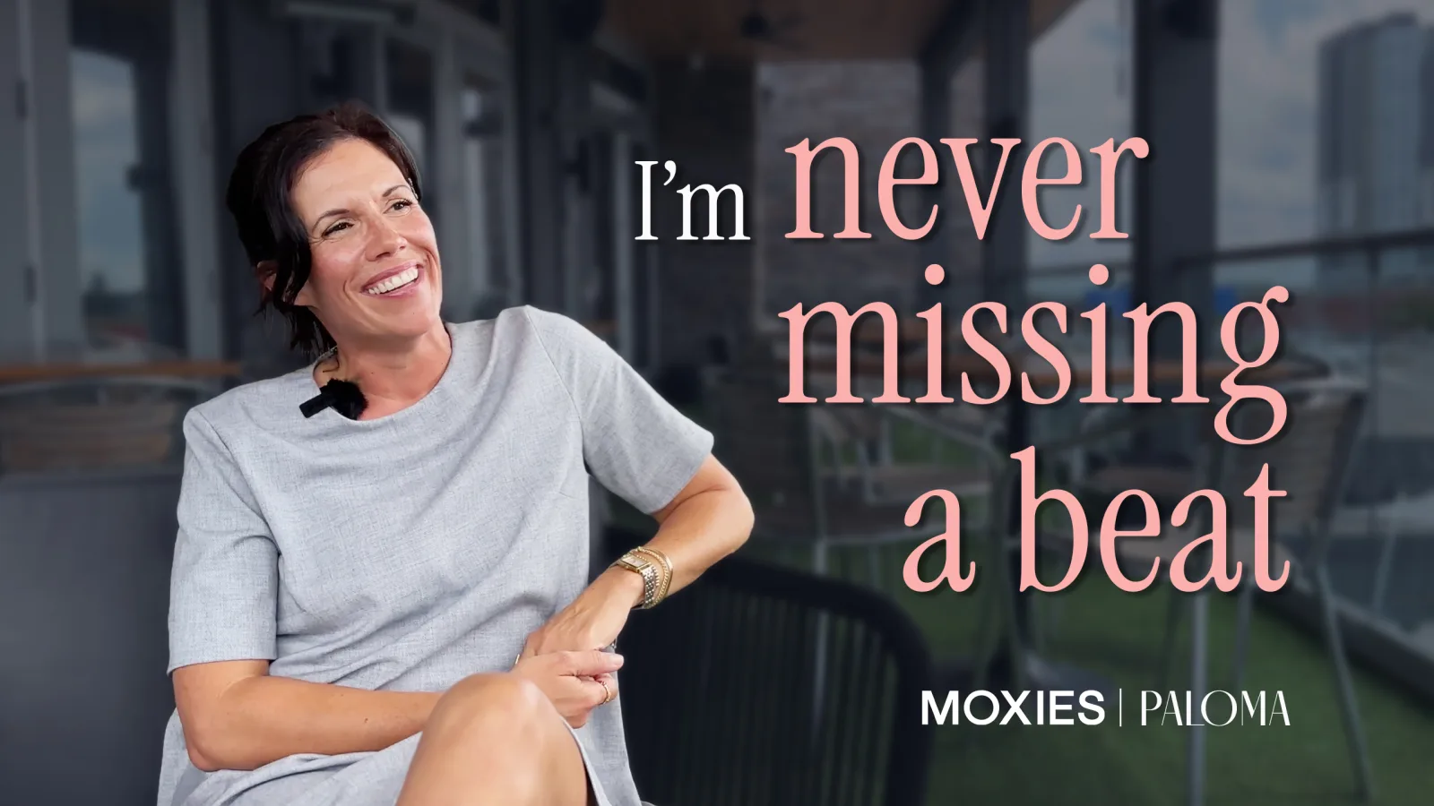 A Moxies event manager seated on a patio, beside the words "I’m never missing a beat"